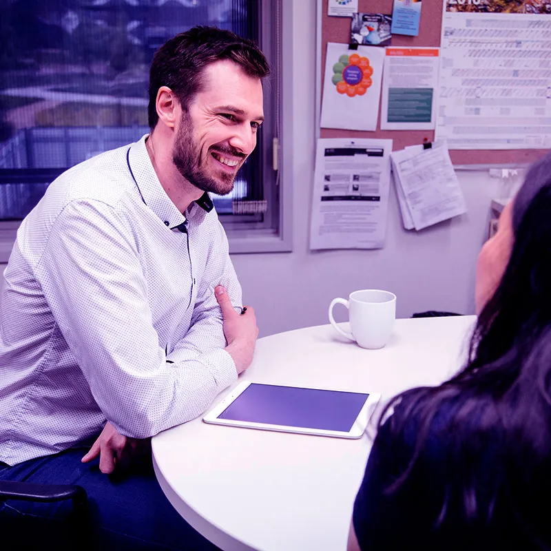 Jay consulting a client